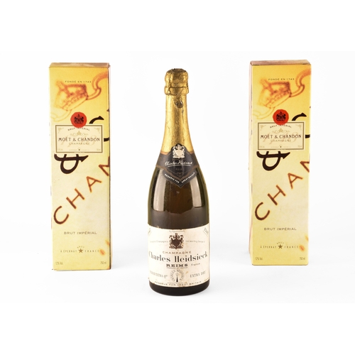 313 - Two boxed bottles of Moët & Chandon Brut impérial champagne, and a bottle of vintage 1947 Charle... 