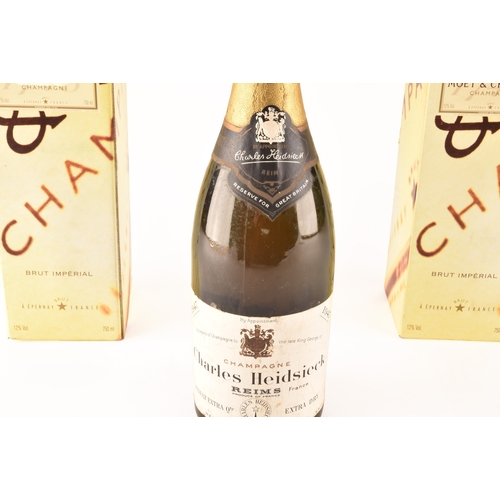 313 - Two boxed bottles of Moët & Chandon Brut impérial champagne, and a bottle of vintage 1947 Charle... 