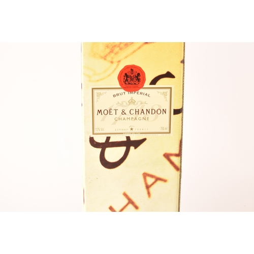 313 - Two boxed bottles of Moët & Chandon Brut impérial champagne, and a bottle of vintage 1947 Charle... 