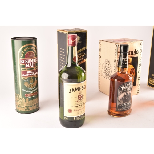 314 - A group of seven bottle of whisky, including Johnnie Walker black label 12 year old, Dimple Haig 12 ... 