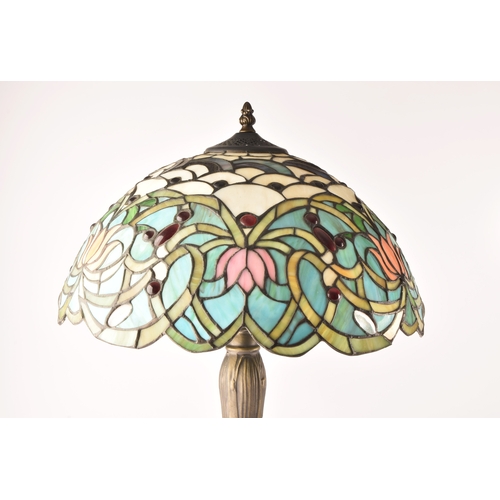 250 - Two Tiffany style coloured led glass table lamps, one decorated with dragonflies measuring 62 cm, th... 