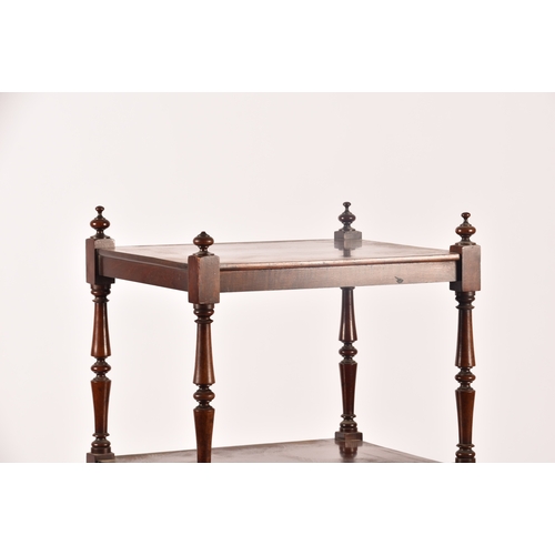 282 - A Victorian mahogany four tier whatnot, with turned columns, single draw to the base and supported o... 