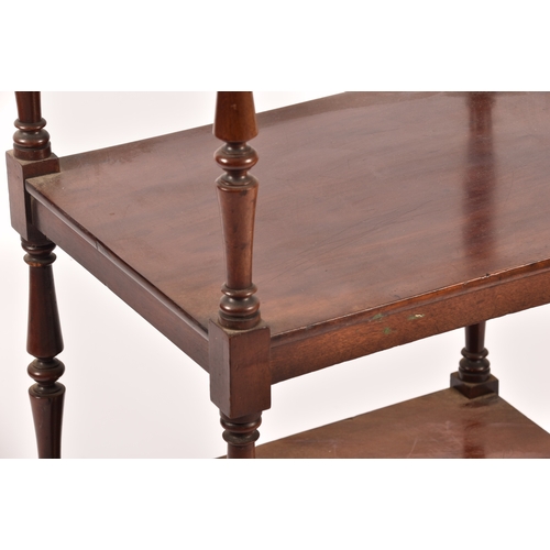 282 - A Victorian mahogany four tier whatnot, with turned columns, single draw to the base and supported o... 