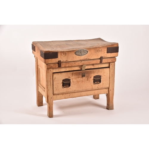 287 - A large Herbert & Sons wooden butchers block on stand, with iron bound corners, supported on a d... 