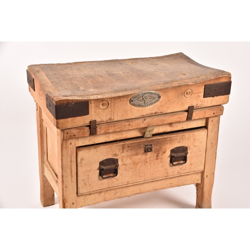 287 - A large Herbert & Sons wooden butchers block on stand, with iron bound corners, supported on a d... 