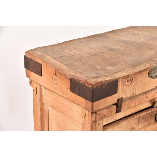 287 - A large Herbert & Sons wooden butchers block on stand, with iron bound corners, supported on a d... 