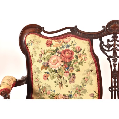 288 - An Edwardian carved mahogany salon suite, comprising a settee, two arm chairs, and four single chair... 