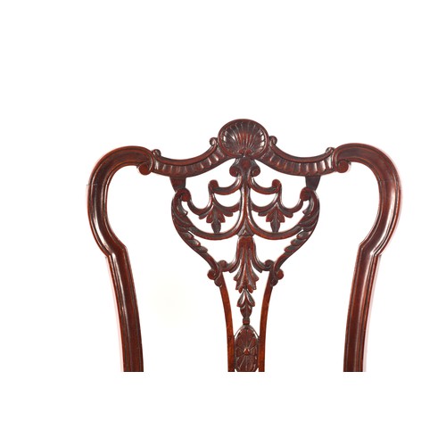 288 - An Edwardian carved mahogany salon suite, comprising a settee, two arm chairs, and four single chair... 