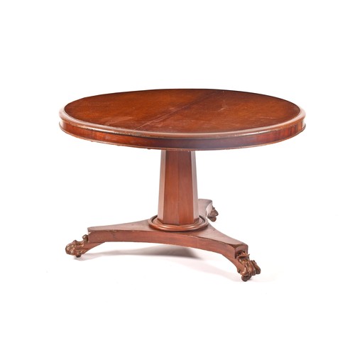 290 - A Regency mahogany circular centre table, the top with moulded rim, supported on a octagonal taperin... 