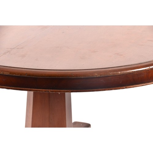 290 - A Regency mahogany circular centre table, the top with moulded rim, supported on a octagonal taperin... 