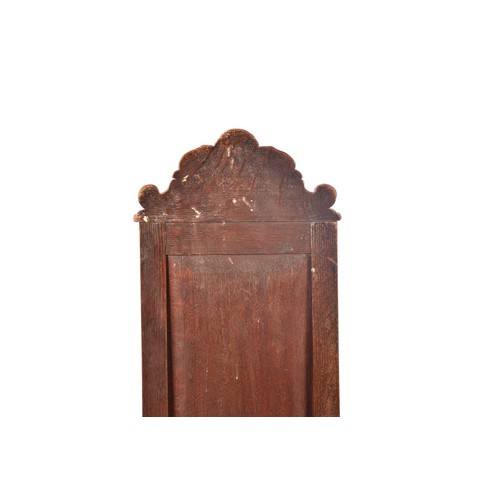 291 - An 19th century carved oak armchair, the back carved with the bust of the green man, above a panel c... 