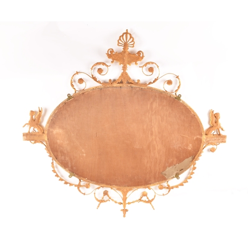 292 - A fine 18th century Adam design gilt gesso oval wall mirror, crested, with an urn and scrolling acan... 