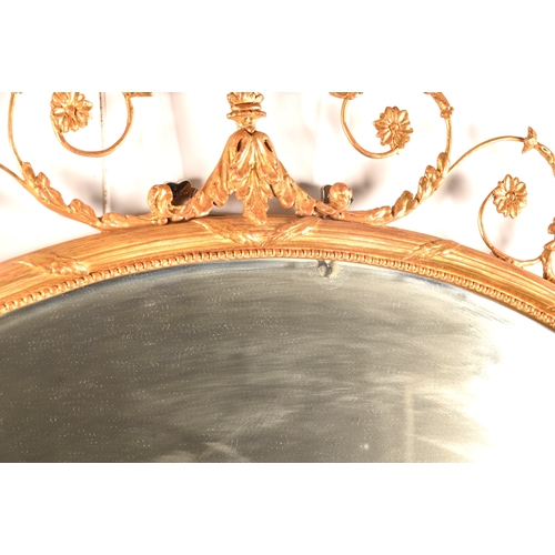 292 - A fine 18th century Adam design gilt gesso oval wall mirror, crested, with an urn and scrolling acan... 