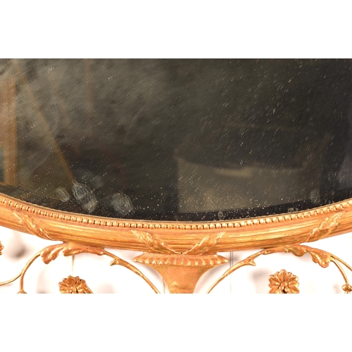 292 - A fine 18th century Adam design gilt gesso oval wall mirror, crested, with an urn and scrolling acan... 