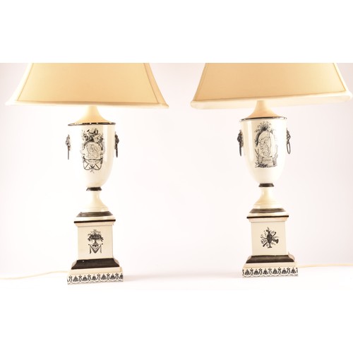 251 - A pair of toleware black and white table lamps, body decorated with maps with Corse and Nievre  Iser... 