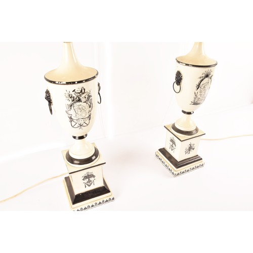 251 - A pair of toleware black and white table lamps, body decorated with maps with Corse and Nievre  Iser... 