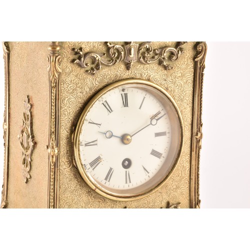 275 - A 19th century French brass mantel clock, with ornate relief decoration and engraved detail, the whi... 