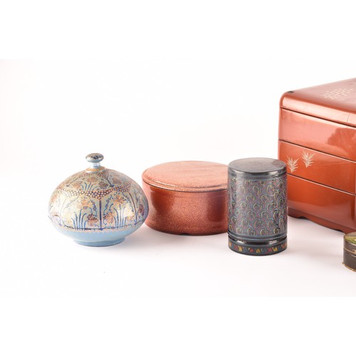 255 - A group of lacquer boxes, including a Japanese red lacquer box and cover, a Victorian box painted wi... 