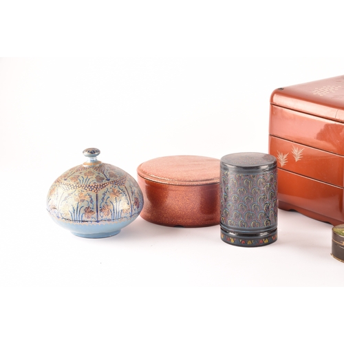 255 - A group of lacquer boxes, including a Japanese red lacquer box and cover, a Victorian box painted wi... 