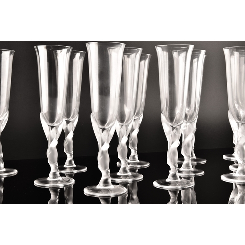 226 - A set of twelve Igor Carl Fabergé crystal champagne flutes, the frosted stems modelled as two kissin... 