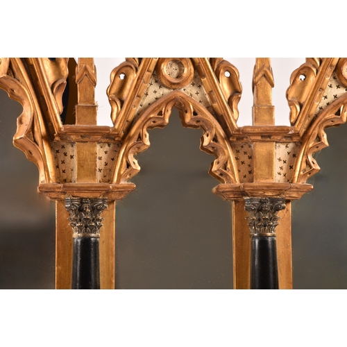 295 - A architectural gilt and painted five panel wall mirror, each panel with gothic carved surround, col... 