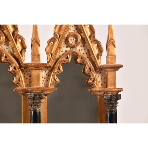 295 - A architectural gilt and painted five panel wall mirror, each panel with gothic carved surround, col... 