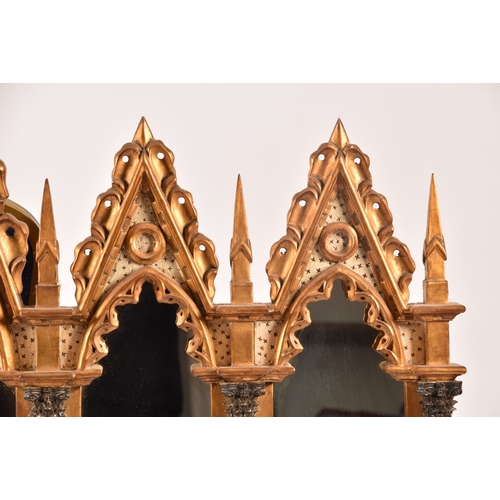 295 - A architectural gilt and painted five panel wall mirror, each panel with gothic carved surround, col... 