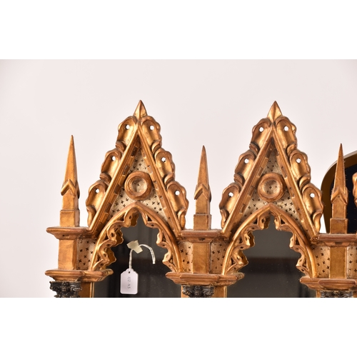 295 - A architectural gilt and painted five panel wall mirror, each panel with gothic carved surround, col... 