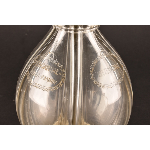 229 - A quadruple glass decanter by Humphrey Taylor of London with individual compartments for curaçao, pe... 