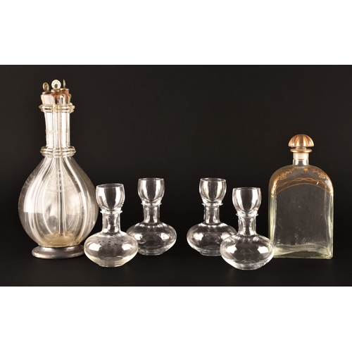 229 - A quadruple glass decanter by Humphrey Taylor of London with individual compartments for curaçao, pe... 