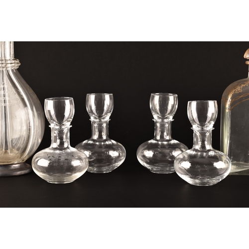 229 - A quadruple glass decanter by Humphrey Taylor of London with individual compartments for curaçao, pe... 