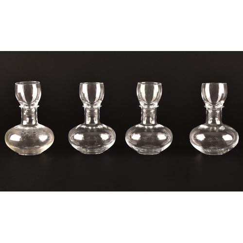 229 - A quadruple glass decanter by Humphrey Taylor of London with individual compartments for curaçao, pe... 