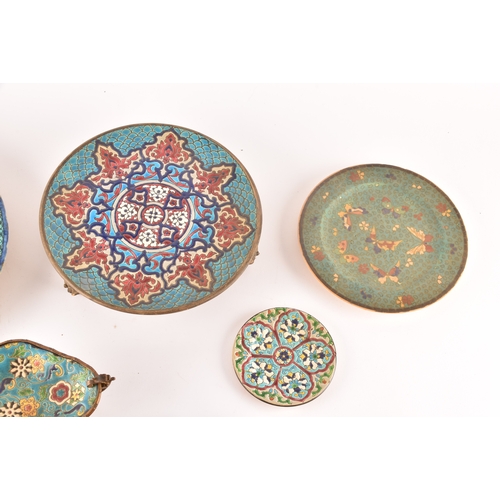 230 - A collection of decorative items, including a French Longwy cloisonné enamel tray and stand, a small... 