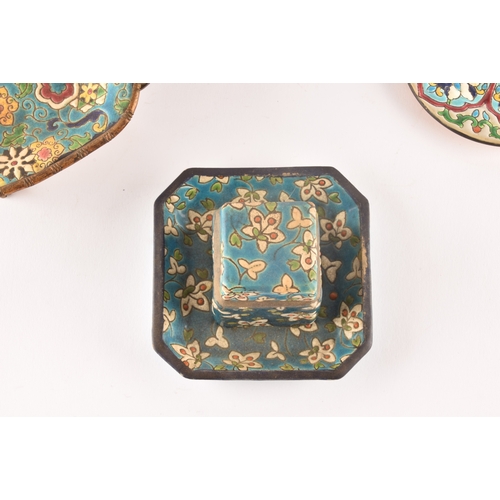 230 - A collection of decorative items, including a French Longwy cloisonné enamel tray and stand, a small... 