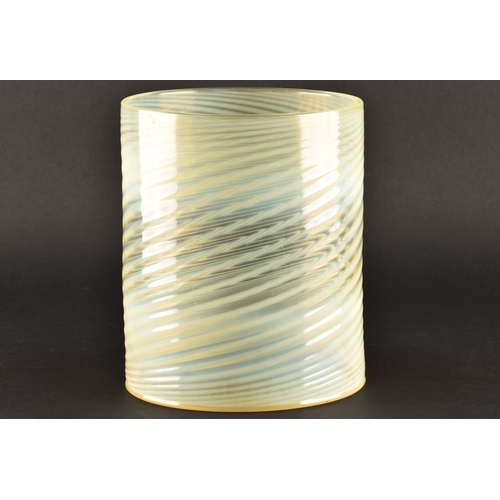 231 - A large opalescent pale green glass light shade, with swirled and ribbed detail, 22 cm high x 18.5 c... 