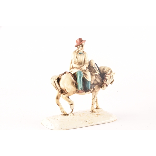 206 - A cold painted bronze of Don Quixote on a horse, 17.5cm.Provenance:Originally bought from the Buddle... 