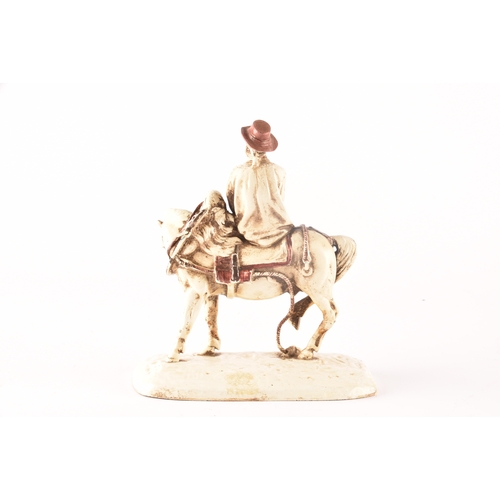 206 - A cold painted bronze of Don Quixote on a horse, 17.5cm.Provenance:Originally bought from the Buddle... 