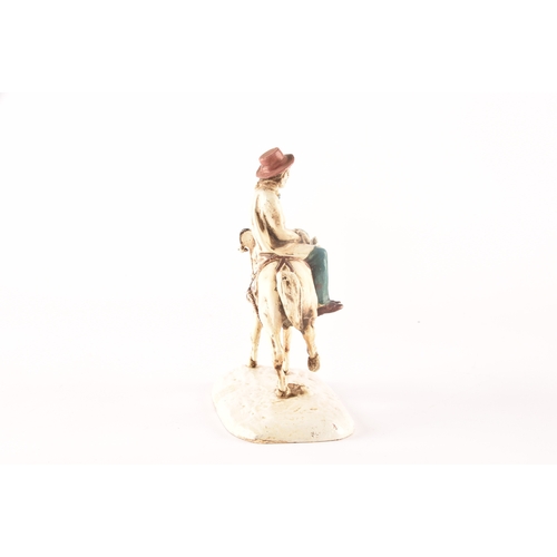 206 - A cold painted bronze of Don Quixote on a horse, 17.5cm.Provenance:Originally bought from the Buddle... 