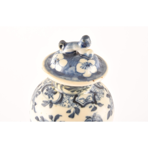 215 - Two 19th century Chinese blue and white vases including a ginger jar and cover decorated with flower... 