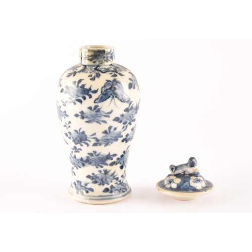 215 - Two 19th century Chinese blue and white vases including a ginger jar and cover decorated with flower... 