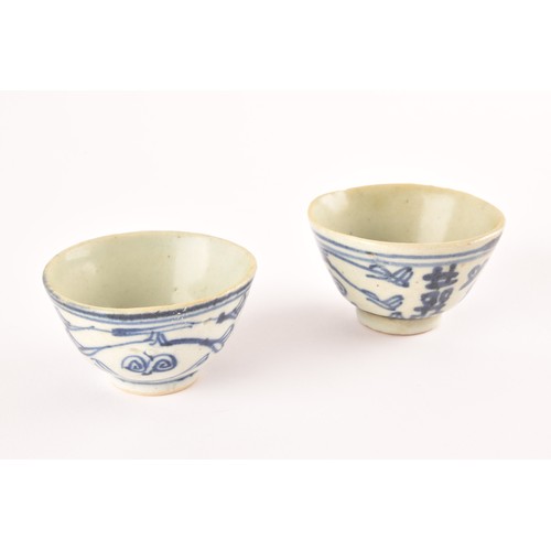 215 - Two 19th century Chinese blue and white vases including a ginger jar and cover decorated with flower... 