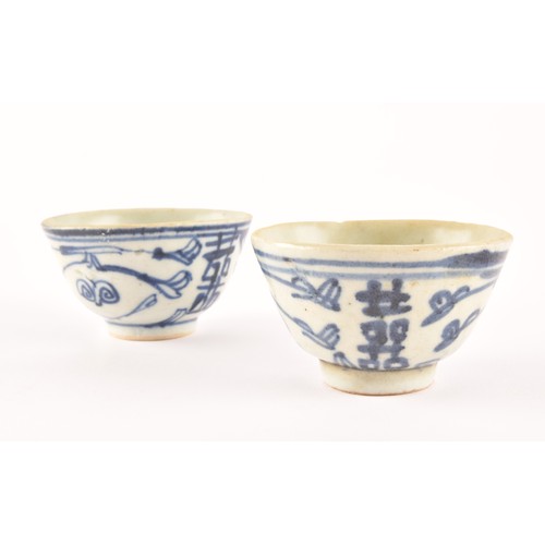 215 - Two 19th century Chinese blue and white vases including a ginger jar and cover decorated with flower... 