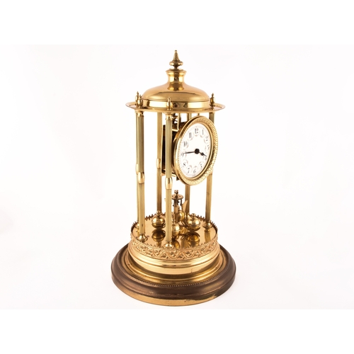 278 - A large German torsion clock timepiece, the cream dial painted with floral motif within a pagoda bra... 