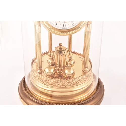 278 - A large German torsion clock timepiece, the cream dial painted with floral motif within a pagoda bra... 