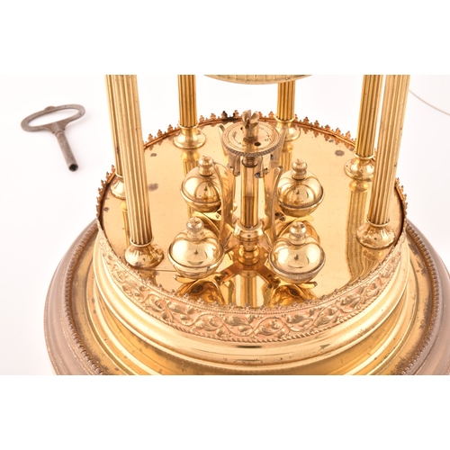 278 - A large German torsion clock timepiece, the cream dial painted with floral motif within a pagoda bra... 