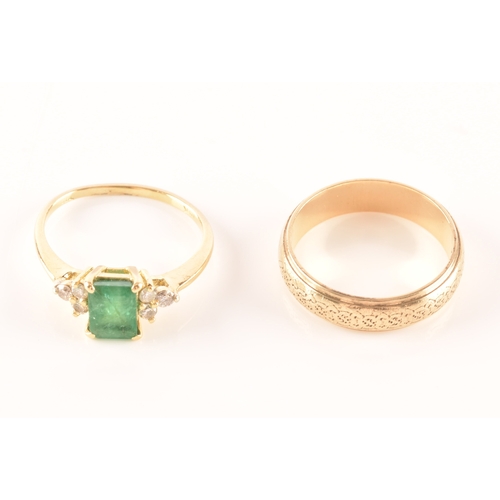 17 - An 18ct yellow gold ring, featuring an rectangular emerald with an approximate weight of 1.10 carats... 