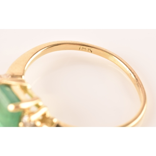 17 - An 18ct yellow gold ring, featuring an rectangular emerald with an approximate weight of 1.10 carats... 