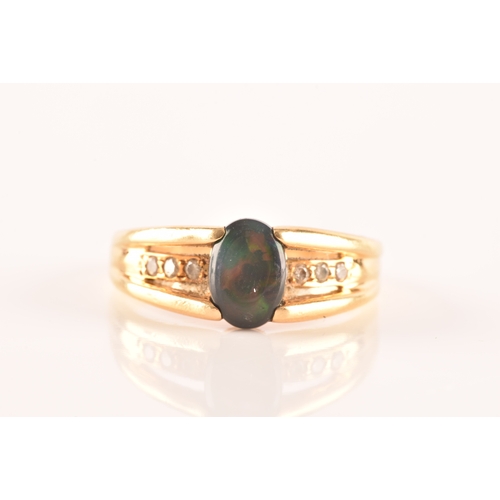 79 - A 18ct yellow gold ring, set to centre with a lightning ridge black opal doublet measuring L 8 x W 5... 