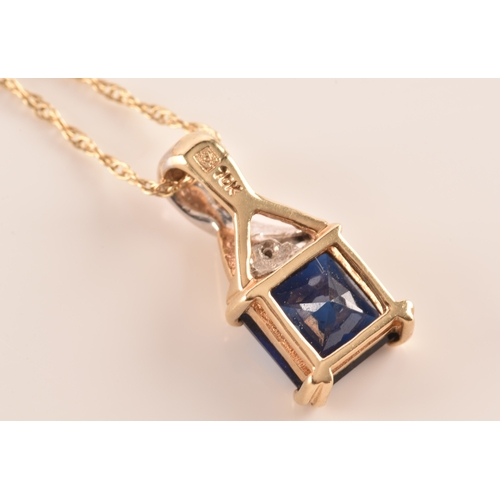 23 - 10ct yellow and white gold pendant and chain, set with a square cut synthetic sapphire with an appro... 