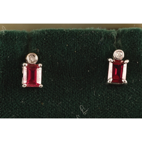 24 - A 9ct yellow gold and white metal synthetic ruby pendant set with a rectangular ruby with an approxi... 